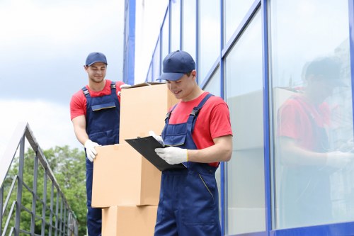 House removals planning in Tootingbec with packed boxes