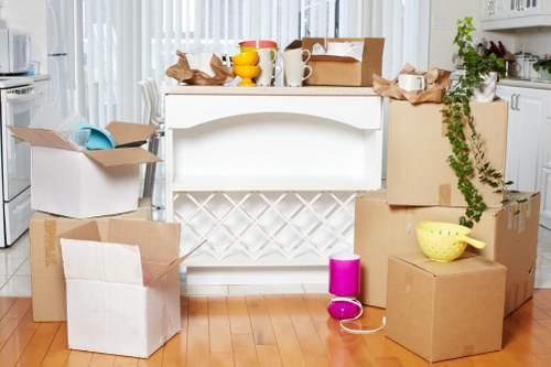Organised household storage space with labeled boxes and furniture