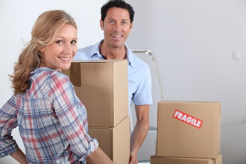 Professional office relocation team handling workplace furniture